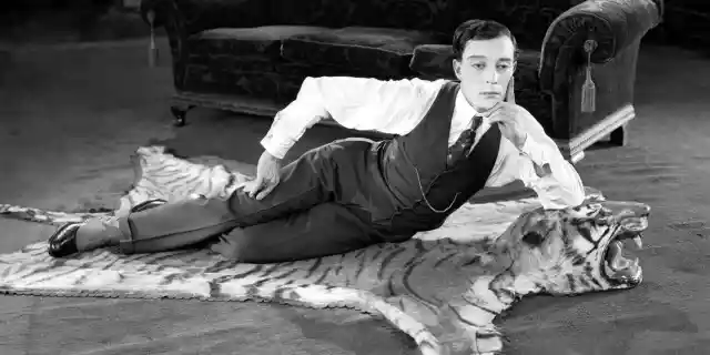 1924: American comedian Buster Keaton (1895-1966) lying on a tigerskin rug in his latest film &#039;The Navigator&#039;.